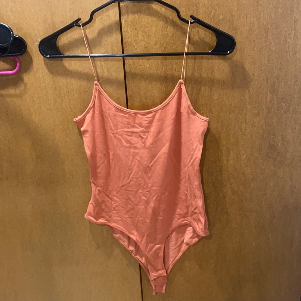 Sleeveless body suit